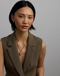 Blue Created Sapphire Gemstone and Diamond Halo Filigree Oval Enhancer Pendant in 10kt Yellow Gold