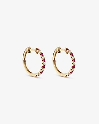 0.22 Carat TW Diamond and Created Ruby Huggie Hoop Earrings in 10kt Yellow Gold