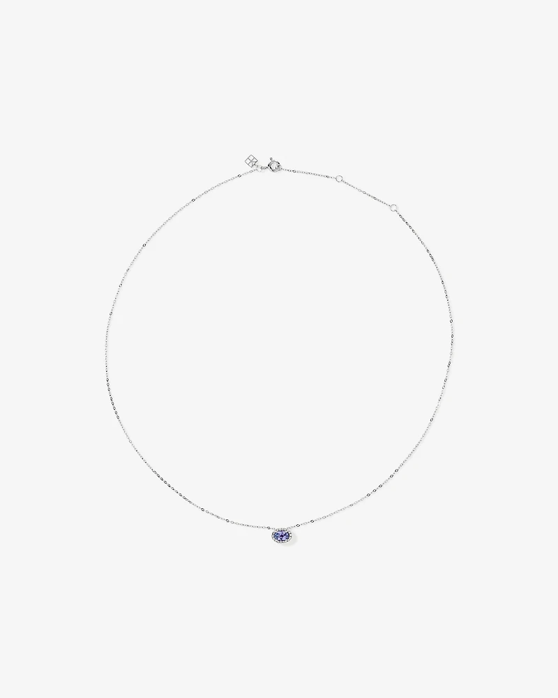 Oval Cut Blue Tanzanite Gemstone and 0.08 Carat TW Diamond Halo Pendant Necklace in 10kt White Gold