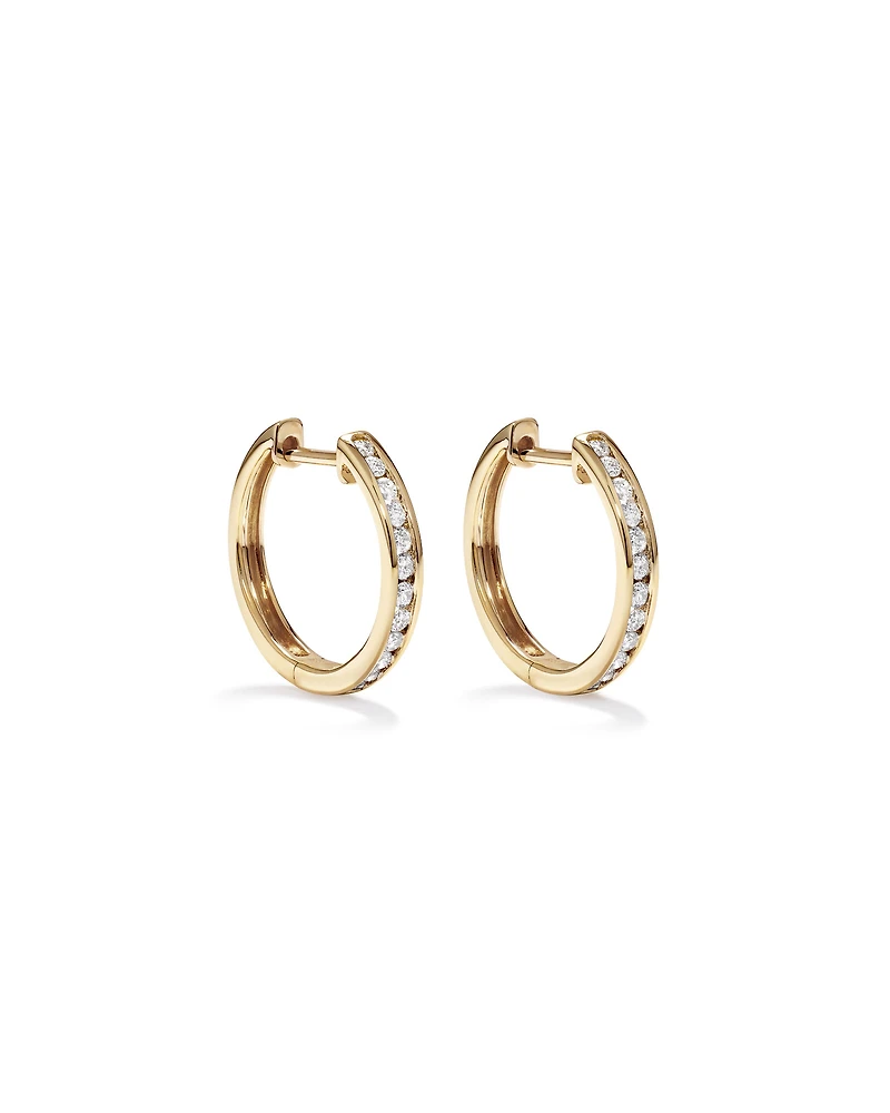 0.25 Carat TW Channel Set Round Brilliant Diamond Huggie Hoop Earrings in 10kt Yellow Gold