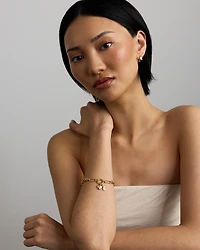 Heart Created Pink Sapphire Pendant in 10kt Yellow Gold