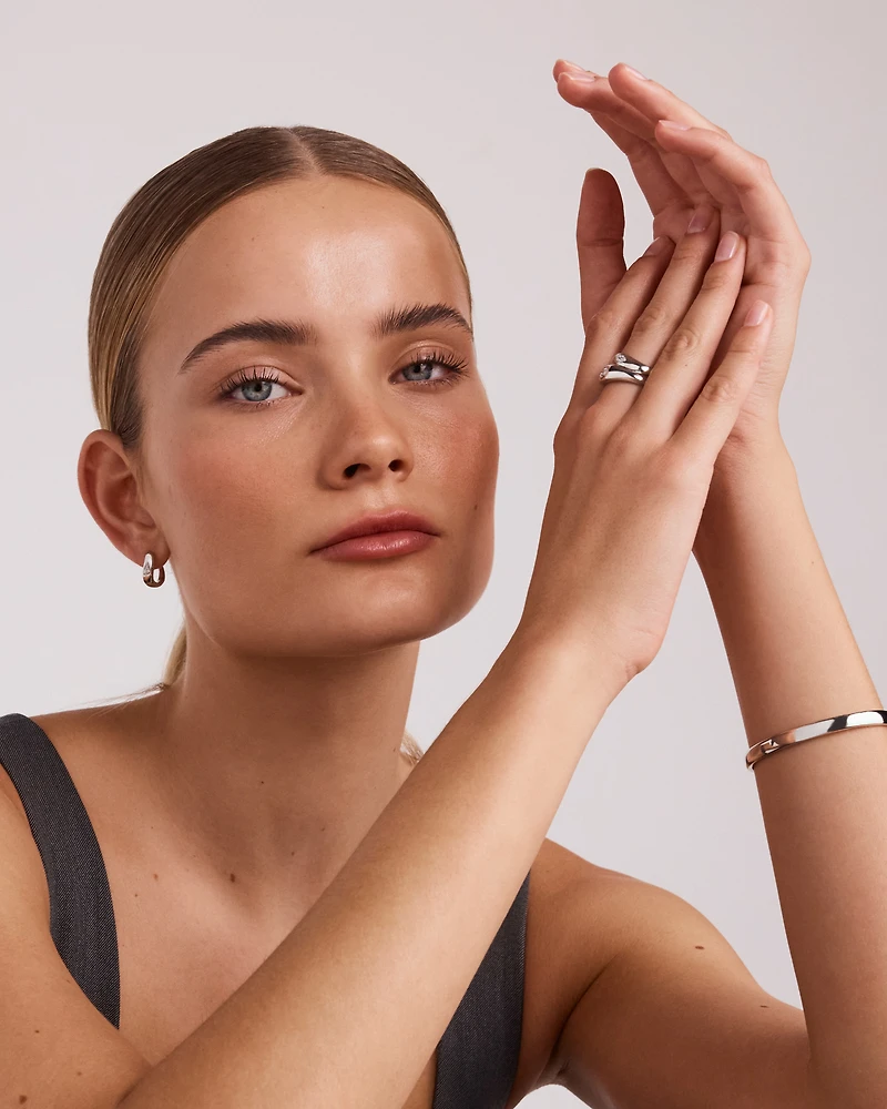 0.20 Carat TW Laboratory-Grown Pear Diamond Hoop Earrings in Sterling Silver