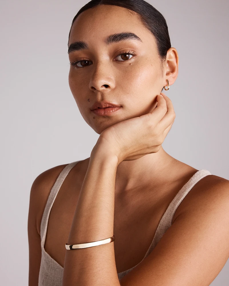 65mm (2.5") 5.7mm Width Solid Oval Bangle in 10kt Yellow Gold