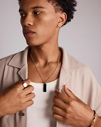 Bouton d'oreille en or jaune 10 K avec diamants totalisant 0,12 ct pour homme