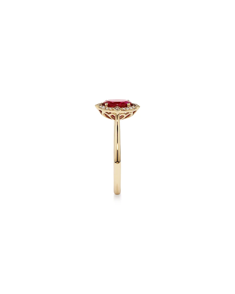 Oval Cut Created Ruby and Diamond Halo Ring in 10kt Yellow Gold