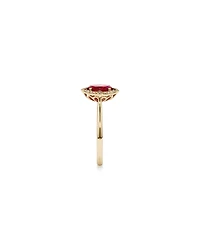 Oval Cut Created Ruby and Diamond Halo Ring in 10kt Yellow Gold