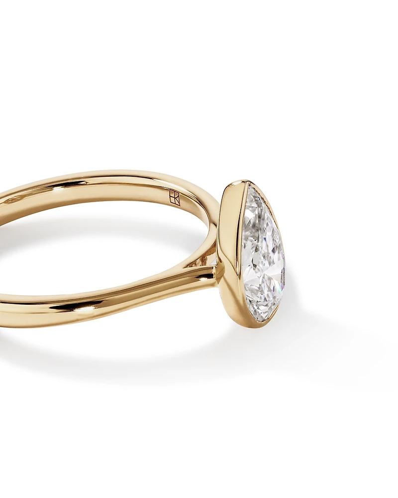 1.25 Carat TW Pear Cut Laboratory-Grown Diamond Solitaire Bezel Set Engagement Ring 14kt Yellow Gold