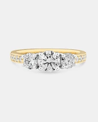 Bague de fiançailles en or blanc et jaune 14 K avec trois pierres et diamants totalisant 1,5 ct