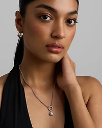 Pendentif boussole rond avec accents de diamants en argent sterling