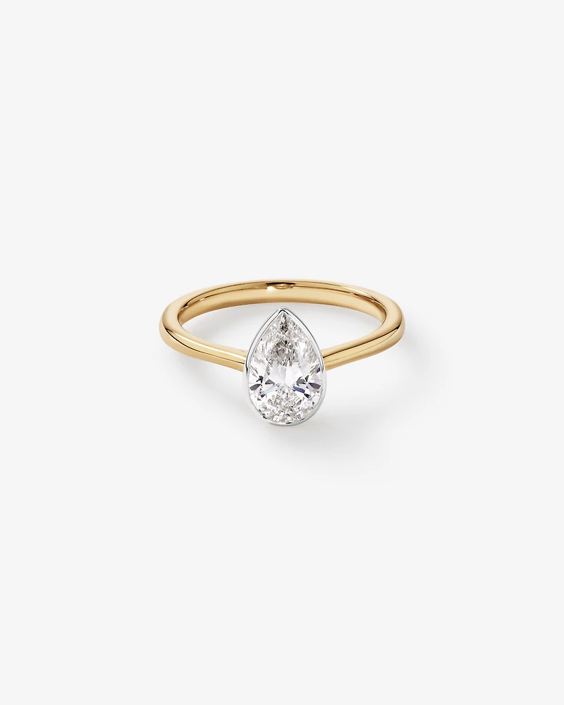 1.25 Carat TW Pear Cut Laboratory-Grown Diamond Solitaire Bezel Set Engagement Ring in 14kt Yellow and White Gold