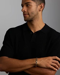 Bracelet de 21 cm en or jaune 10 K et rhodium noir à diamants noirs totalisant 0,43 ct