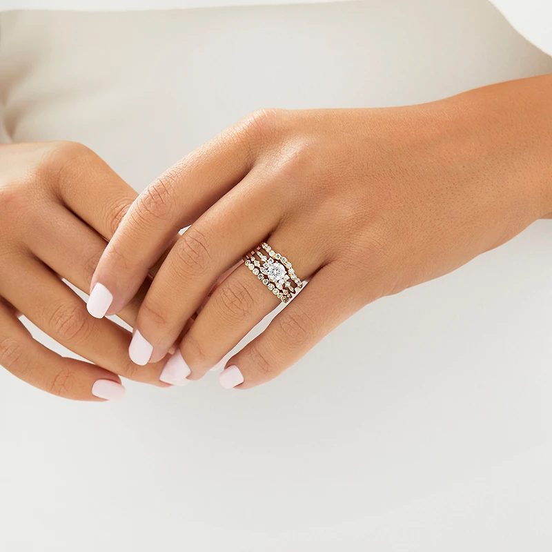 Wedding Ring with 0.15 Carat TW Diamonds in 14kt Yellow Gold