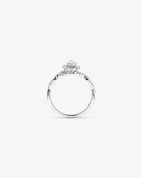 0,75 carat TW bague de fiançailles torsadée avec halo et diamant taille poire en or blanc 14 carats