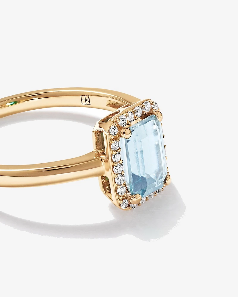Bague halo Aigue-marine taille émeraude avec diamants en or jaune 10 ct