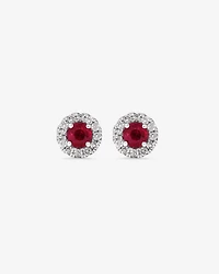 Boutons d'oreilles à halo en or jaune 10 K avec rubis naturel et diamants totalisant 0,28 ct