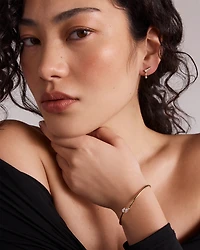 0.60 Carat TW of Laboratory-Grown Pear Cut Diamond Torque Bangle in 10kt Yellow Gold