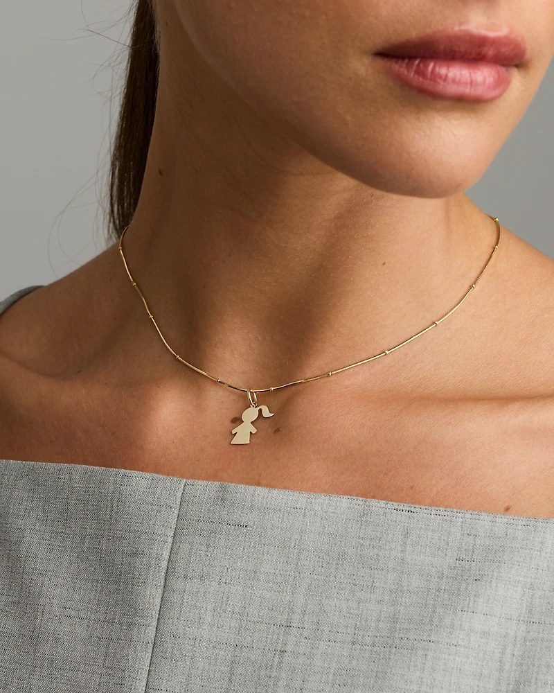 Pendentif fille en or jaune 10 kt