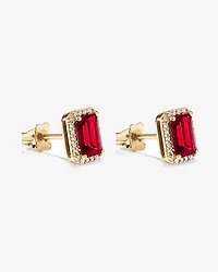Emerald Cut Created Ruby and Diamond Halo Earrings in 10kt Yellow Gold