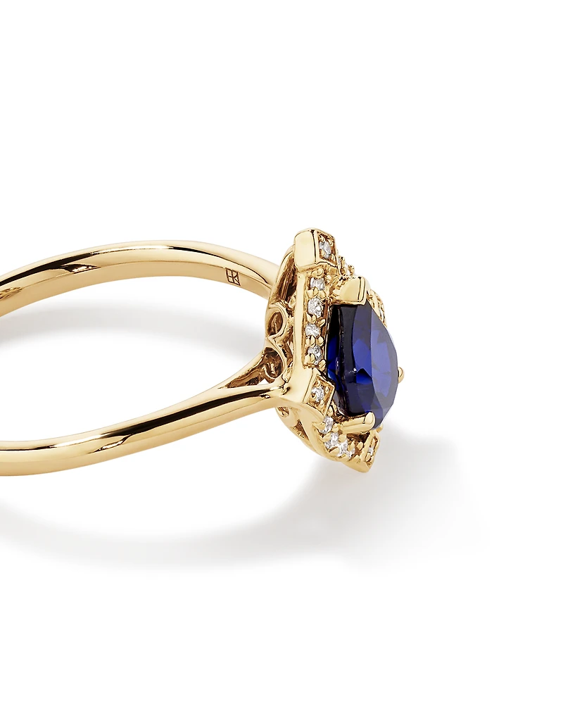 Pear Cut Created Sapphire and Diamond Halo Ring in 10kt Yellow Gold