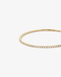 0.68 Carat TW Diamond Row Flex Bangle in 10kt Yellow Gold