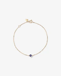 Boutons d'oreilles en or jaune 10 K avec tanzanite