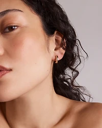 0.50 Carat TW of Laboratory-Grown Pear Cut Diamond Huggie Earrings in 10kt Yellow Gold