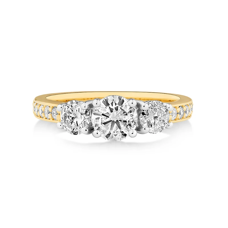 Bague de fiançailles en or blanc et jaune 14 K avec trois pierres et diamants totalisant 1,5 ct