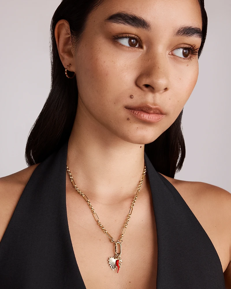 0.22 Carat TW Diamond and Created Ruby Huggie Hoop Earrings in 10kt Yellow Gold