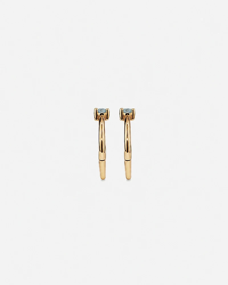 10mm Blue Topaz Accent Sleepers in 10kt Yellow Gold