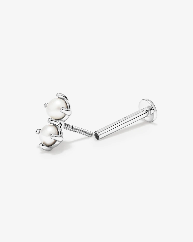 Boucle d'oreille hélix deux pierres en perles de culture d'eau douce et or blanc 10 carats