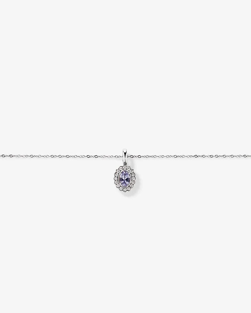 Tanzanite & 0.15TW of Diamond Halo Pendant with Chain in 10kt Gold