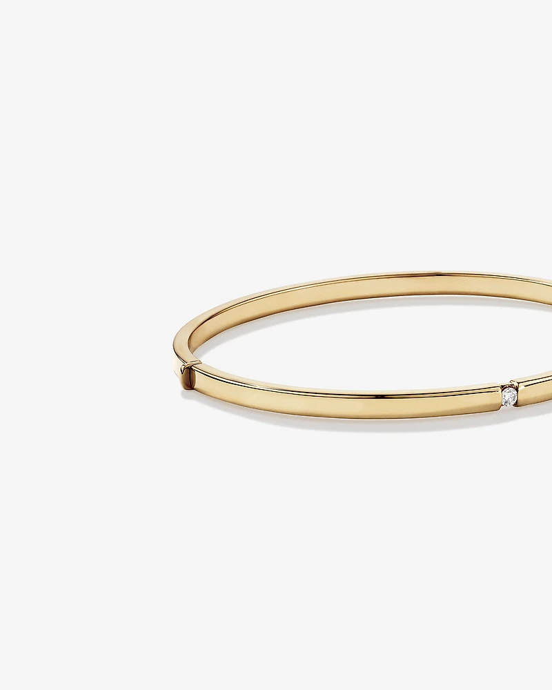 Diamond Accent Oval Bangle in 10kt Yellow Gold