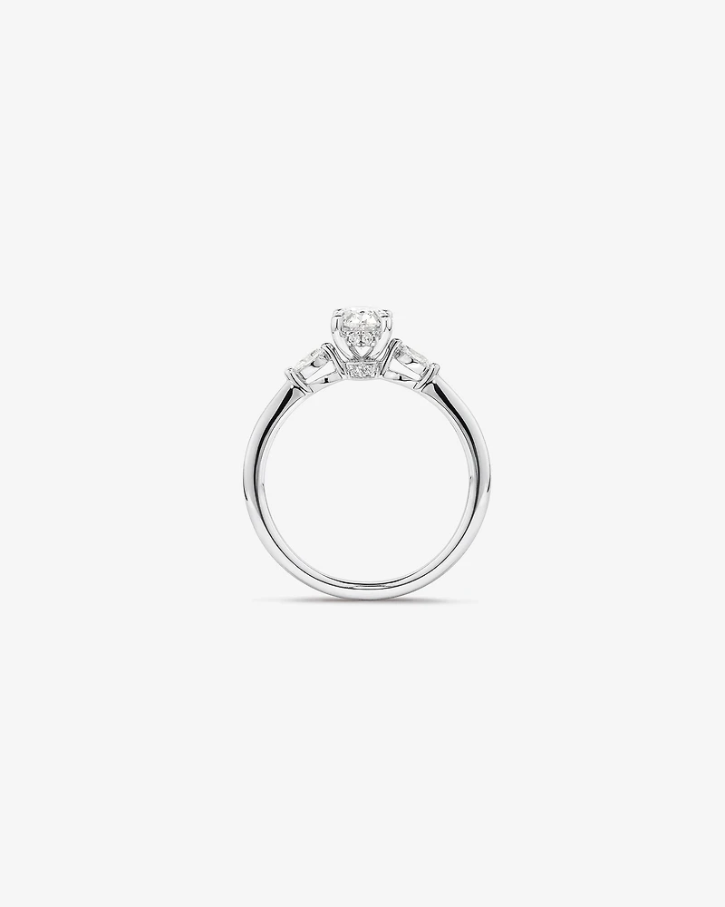 0.77 Carat TW Three Stone Oval and Marquise Cut Hidden Halo Engagement Ring in Platinum