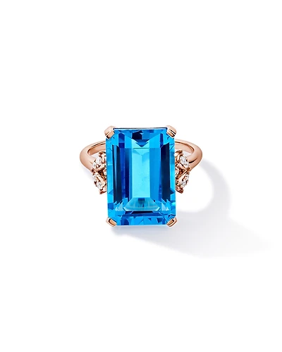 Bague en topaze bleue suisse taillée émeraude et diamant TW 0,08 carat or rose 10 carats