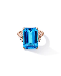 Bague en topaze bleue suisse taillée émeraude et diamant TW 0,08 carat or rose 10 carats