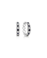 Anneaux courts à bulles en or blanc 14 K avec saphir et diamants totalisant 0,52 ct