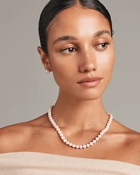 Stud Earrings with 9mm Button Cultured Freshwater Pearls in Sterling Silver