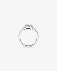Oval Cut Blue Aquamarine Gemstone and 0.29 Carat TW Diamond Halo Ring in 10kt White Gold