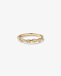 0.11 Carat TW Diamond Twist Wedding Ring in 14kt Yellow Gold