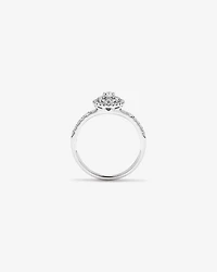0.58 Carat TW Oval Diamond Halo Baguette Side Accent Engagement Ring in 14kt White Gold