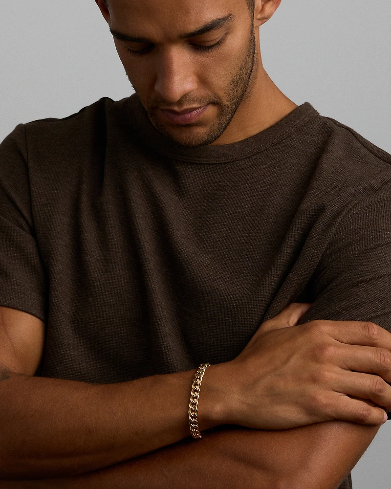 23cm (22") 9mm Width Semi Solid Diamond Cut Curb Bracelet in 10kt Yellow Gold