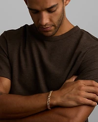 23cm (22") 9mm Width Semi Solid Diamond Cut Curb Bracelet in 10kt Yellow Gold