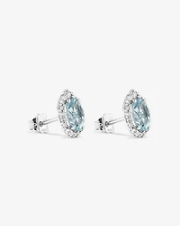 Oval Cut Blue Aquamarine Gemstone and 0.27 Carat TW Diamond Halo Stud Earrings in 10kt White Gold
