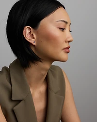 Stud Earrings with Blue Created Sapphire  in 10kt Yellow Gold