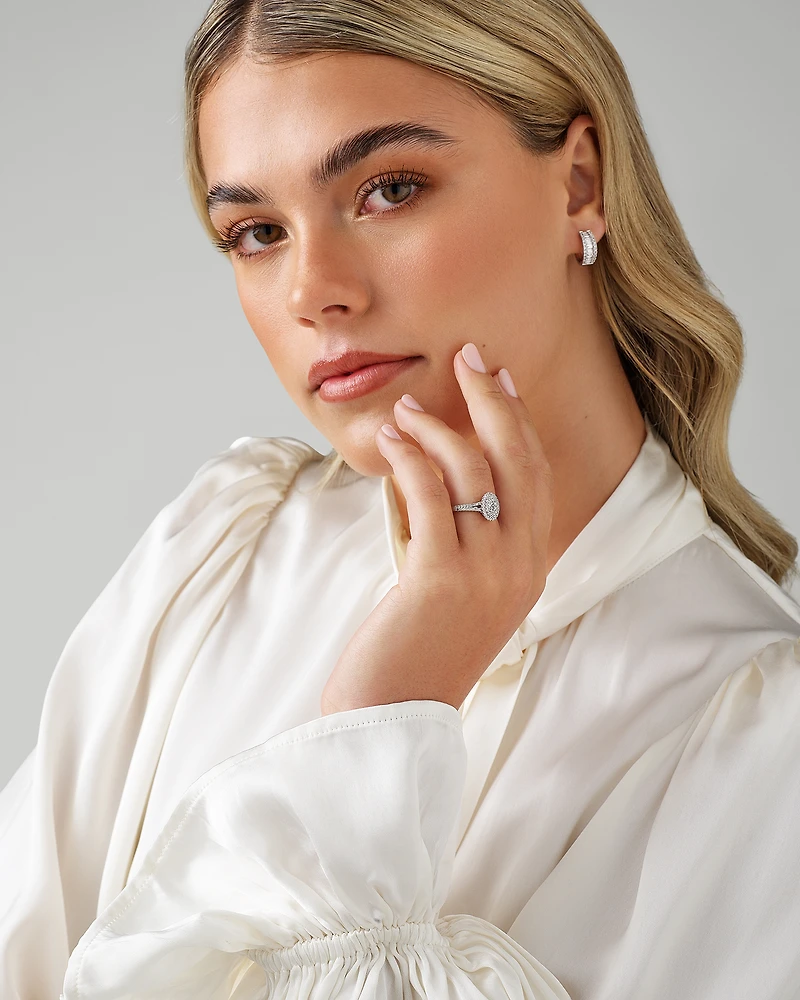 0.30 Carat TW Oval Shaped Cluster Halo Diamond Ring in 10kt White Gold