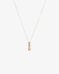 0.07 Carat TW Diamond Knots Pendant in 10kt Yellow Gold