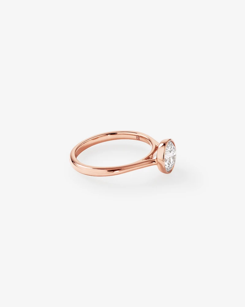 1.25 Carat TW Round Brilliant Laboratory-Grown Diamond Solitaire Bezel Set Engagement Ring in 14kt Rose Gold