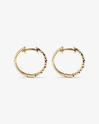 0.22 Carat TW Diamond and Created Sapphire Huggie Hoop Earrings in 10kt Yellow Gold