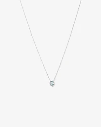 Oval Cut Blue Aquamarine Gemstone and 0.19 Carat TW Diamond Halo Pendant Necklace in 10kt White Gold
