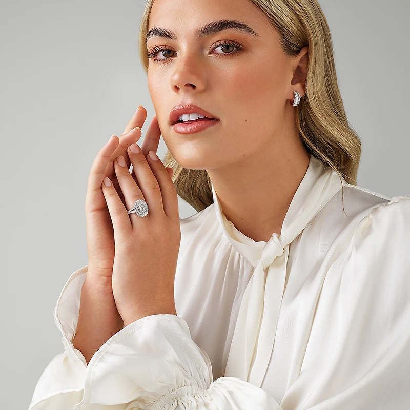 1.30 Carat TW Oval Shaped Cluster Halo Diamond Ring in 10kt White Gold